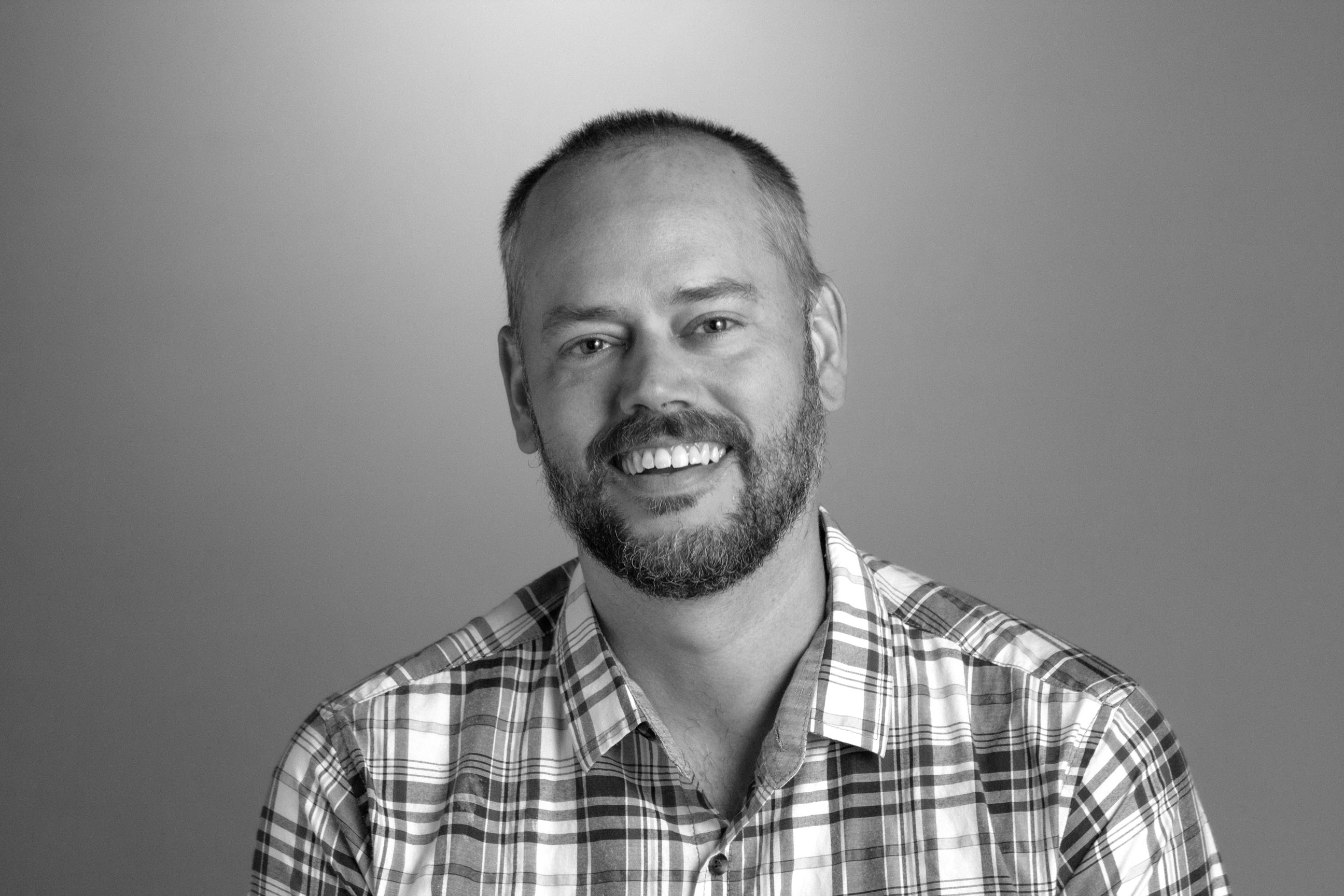 Jared headshot in black and white