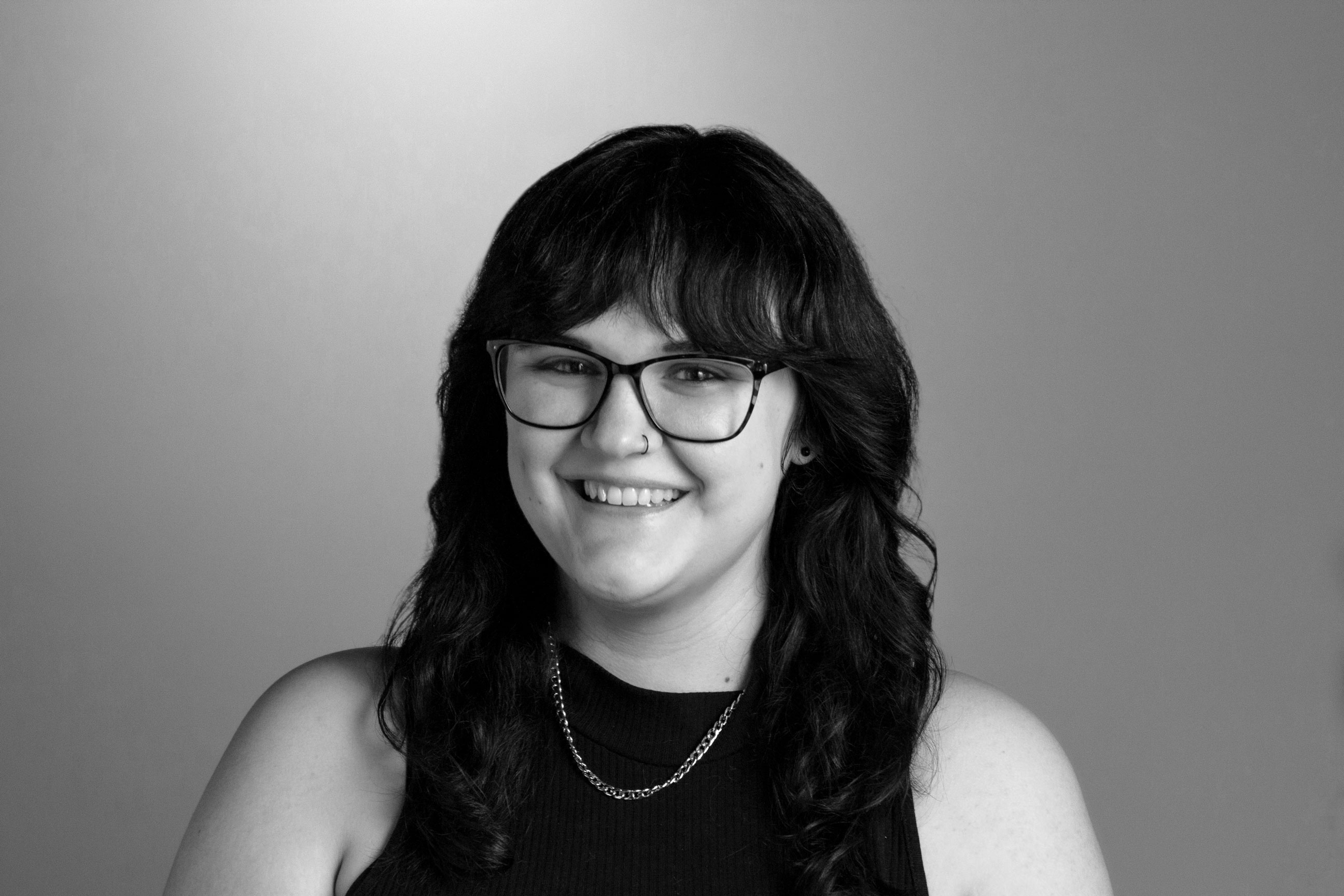 Headshot of Krystal in black and white