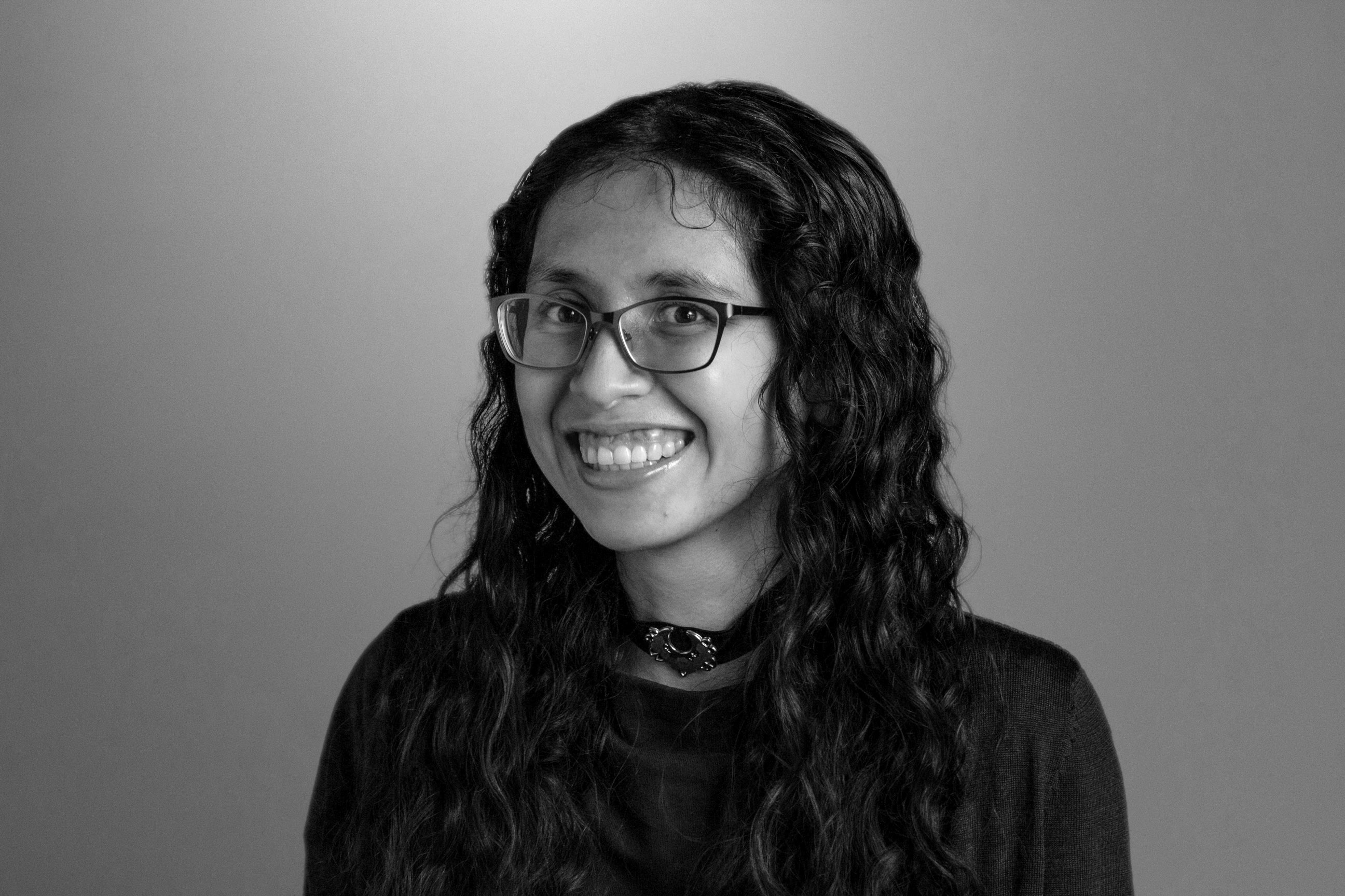 Headshot for Lauren in black and white